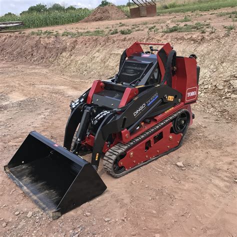 dingo bucket size vs skid steer|dingo mini track loader.